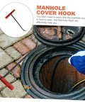 Badass Heavy Duty Steel Manhole Cover Lifter Hook Built With A Nifty T Handle to lift storm drain grates on pavement.