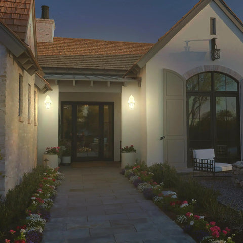 Dusk To Dawn Outdoor Wall Lights Two Pack With Aluminum Housing And Clear Glass Waterproof Porch Lanterns illuminating entryway