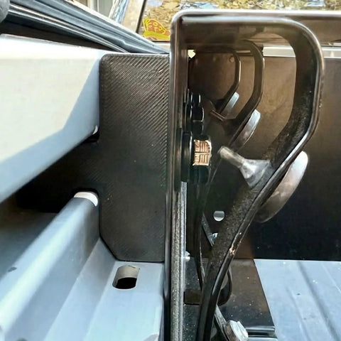 Truck Bed Rail Mount Point For Extra Tie Points And Cargo Organization Universal Utility Bracket installed in pickup bed