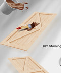 36 Inch By 84 Inch Solid Spruce Sliding Barn Door With A Six Point Six Foot Hardware Kit And Included Handle Assembly Required Stainable K Frame For Custom Finishes Smooth Quiet Glide For Home Or Office shown with DIY staining setup including paintbrush and wood stain.