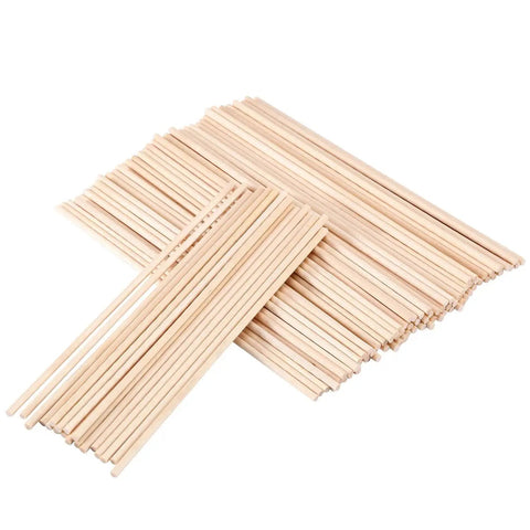 Premium Unfinished Wood Dowel Rods 1/8 Inch Diameter By 12 Inches Long, Smooth Natural Birch Hardwood Craft Sticks, 100 Pack displayed in a pile.