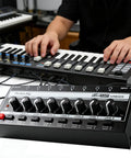 HA800S Eight Channel Stereo Line Mixer for Sub Mixing with controls shown in a studio setup with keyboard