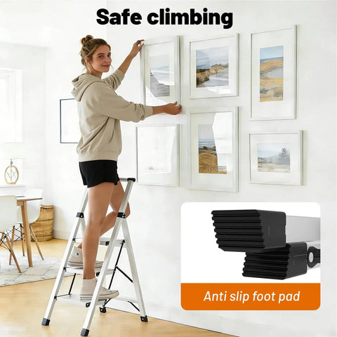 Ultra Lightweight Aluminum 3 Step Ladder Folding Stool With Safety Handrail Heavy Duty 600 Pound Capacity Anti Slip Pedals Slim Fold Design For Home Use And Everyday DIY Projects, woman on 3-step ladder hanging wall art