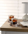 Premium Round Cowhide Coasters Set Of Twelve Natural Leather Drink Mats Ultra Smooth Finish under glasses on wooden table.