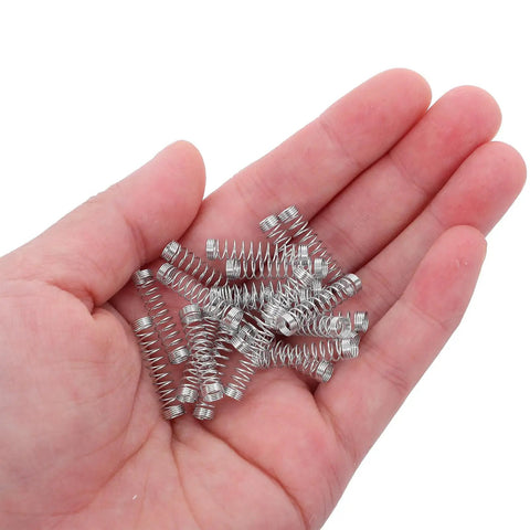 50 Pcs Compression Springs Assortment Kit For High Grade Stainless Steel Pen Refills, Tiny Mechanical Repairs, Diy Office Projects And School Writing Tools With Perfect Tension For Smooth Ink Flow And Zero Jamming. 0.4mm x 18mm springs in hand