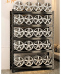 Top Shelf Five Tier Metal Shelving Unit Heavy Duty Storage Rack Industrial Grade Organizing Shelves Built Rugged For Garage Basement Workshop Warehouse And Kitchen Projects displaying shiny metal wheels organized on five tiers.