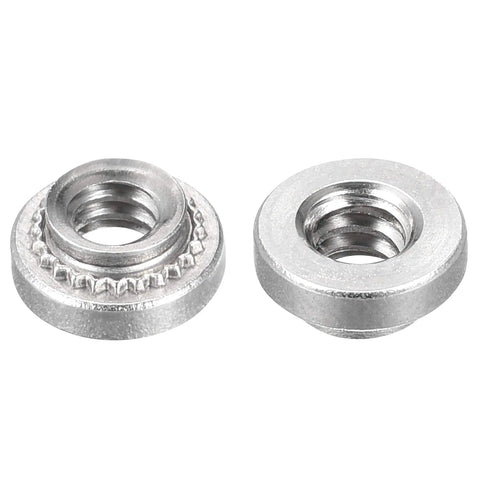 Badass Stainless Steel Self Clinching Rivet Nuts Size Six Thread Round Head Sheet Metal Fasteners With Tight Grip And No Sweat Installation Includes One Hundred Heavy Duty Hardware Pieces showing two stainless steel nuts.