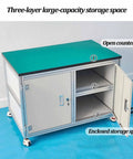 Rock Solid Rolling Workbench With Antistatic Surface And Heavy Duty Steel Frame Built Damn Tough Three Tier Storage Cart showing open counter and enclosed space.