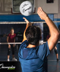Player serving Rubber Volleyball Official Size For Indoor And Outdoor Play Durable Regulation Ball For Beginners To Pros Perfect For Recreational And Competitive Pick Up Games Premium White VR4 Set
