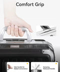 Close-up of top handle on 20-inch charcoal metallic polycarbonate carry-on luggage with aluminum frame.