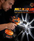 Magsen Cordless Impact Wrench With 700 Ft-Lbs High Torque Brushless Motor And 21V Dual Batteries Includes Six Sockets Hard Case For Car Tire Lug Nut Removal Home Auto Mechanic Tools Heavy Duty Power being used by a mechanic with an LED light on a car tire.