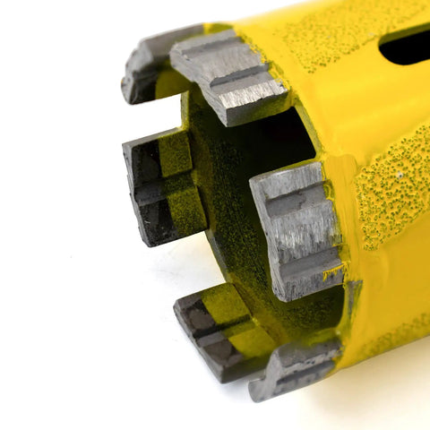 Close-up of yellow 2 Inch Diamond Core Drill Bit for Dry and Wet Use with Vacuum Brazed Granite Hole Saw showing teeth and openings