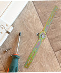 heavy-duty adjustable hinge with tools on wooden surface