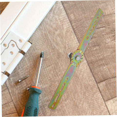 heavy-duty adjustable hinge with tools on wooden surface
