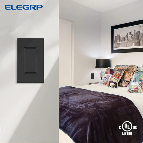 Matte Black 3 Way Decorative Light Switch With Wall Plate, 15 Amp, 120-277 Volt AC Rocker Paddle in a bedroom setting