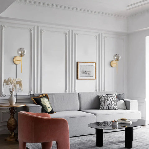 2 Light Plug In Globe Wall Sconce With Smoky Gray Glass Shade And Brass Finish Delivers A Cozy Vibe In Modern Living Room