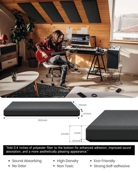 Young man playing guitar with Top Shelf 4 Pack Acoustic Panels 2.4 Inch Thick Fiberglass Soundproof Wall Panels in black.