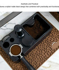Matte Black Coffee Tamping Station With Knock Box Powder Organizer For Espresso Prep showing coffee grounds and portafilter.