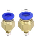 Two brass quick fittings with blue caps, 6mm and 8mm sizes, both with M5 threads, for pneumatic systems.