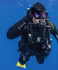 Diver wearing Hydros X Front-Adjustable Men's Scuba BCD With Balanced Power Inflator exploring underwater