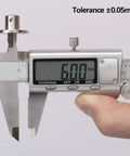 Caliper measuring 6mm bore on 2 Pack 6mm Flange Coupling Connector For DIY RC Motors, showing high precision.