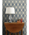 Premium Navy Trellis Wallpaper With Snazzy Linen Weave Hella Durable Polyester Surface Sweet For Kitchens Bathrooms And Commercial Lobbies Straight Paste To Paper Setup Reliable Type Two Finish, featuring a lamp and books on a table.