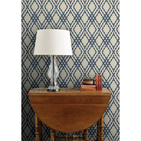 Premium Navy Trellis Wallpaper With Snazzy Linen Weave Hella Durable Polyester Surface Sweet For Kitchens Bathrooms And Commercial Lobbies Straight Paste To Paper Setup Reliable Type Two Finish, featuring a lamp and books on a table.