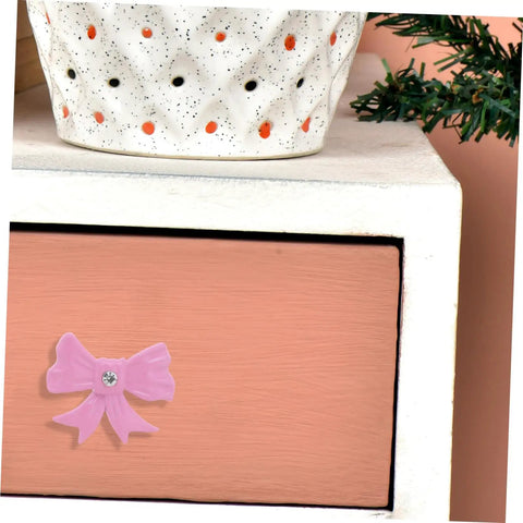 Super Dope Pink Bow Cabinet Pulls Pack Eight Piece Alloy Dresser Knobs For Girls Bedroom Refresh Easy Mount Cabinet Hardware with pink bow pull on dresser.