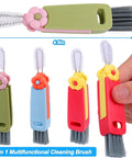 Hand holding 3 In 1 Cup Lid Gap Cleaning Brush Set For Water Bottles And Tumblers, Gunk Busting Crevice Cleaner, 4.9 x 0.9 in, pack of 3