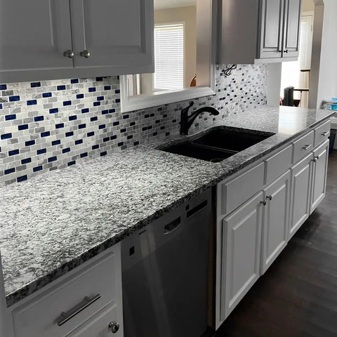 Kitchen backsplash with Blue Crystal Glass and Gray Stone Mosaic 1x2 Subway Tile Sheet, 12x12 Inches, polished marble look.