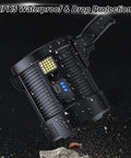 Ridiculously Bright 990000 Lumen Handheld Spotlight with IPX5 Waterproof Rating and USB Ports, showcasing durability in outdoor settings.