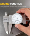 Hand using 6 Inch Dial Caliper With 0.001 Inch Graduation Precise Inside And Outside Measurement Tool on metal surface.