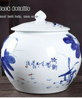 Heavy Duty Ceramic Airtight Rice Bin And Cereal Canister With Retro Chinese Motifs in warm color and round shape.