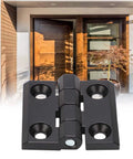 Zinc Alloy Door Switch Hinge With Double Spring 39x40mm, black finish, screw mount displayed in front of wooden door