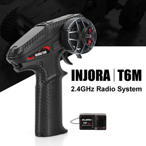 Black 2.4GHz Transmitter With 6CH Receiver For 1/24 And 1/18 RC Crawlers, FHSS 67 Channel Frequency Hop, in a compact design.