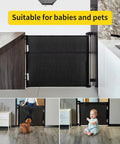 Retractable Mesh Baby Gate For Doorways, Stairs, And Hallways, 33 Inch Tall, Expands Up To 55 Inches Wide, Indoor Outdoor Baby And Pet Gate, Black Safe Easy Tool Free Setup shown in home setting with child and pet.