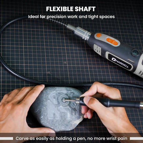 Total Game Changer Rotary Tool With Flex Shaft, 200W Corded Beast showing flexible shaft carving a design on stone.