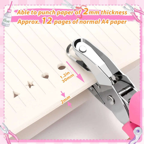 Close-up of the Four Piece 0.25 Inch Hole Punch Set punching paper, showing circle, heart, star, triangle shapes, soft handles visible.
