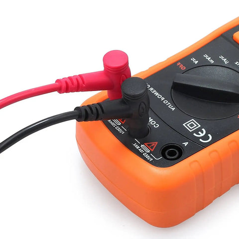 Ultra Sharp Multimeter Probe Leads Kit With Gold Plated Test Probes connected to an orange digital multimeter device