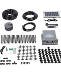 Solar Powered Automatic Drip Irrigation System With 50 Drippers And 155 Feet Of Tubing laid out with components and connectors.