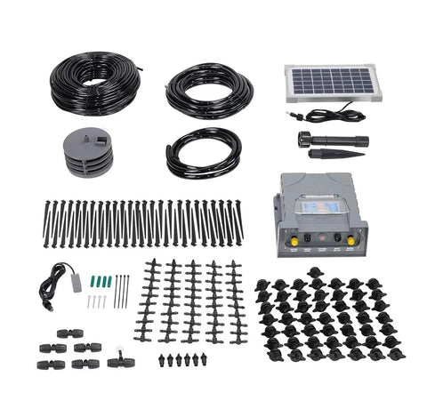 Solar Powered Automatic Drip Irrigation System With 50 Drippers And 155 Feet Of Tubing laid out with components and connectors.