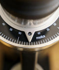 Close-up of grind size dial on Heavy Duty 64Mm Flat Burr Electric Coffee Grinder Designed For Single Dosing Habits With Anti Popcorn Guard.