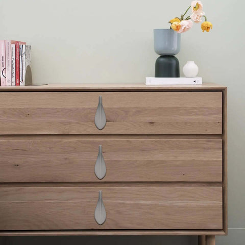 Dope Loquat Leaf Zinc Alloy Cabinet Pulls And Drawer Handles Set In Pearl Gray Finish on wooden dresser