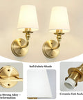 Onwecen Wall Sconces Set of 2, Modern Bathroom Light Fixtures, Brushed Gold with soft fabric shades and ceramic E26 socket.