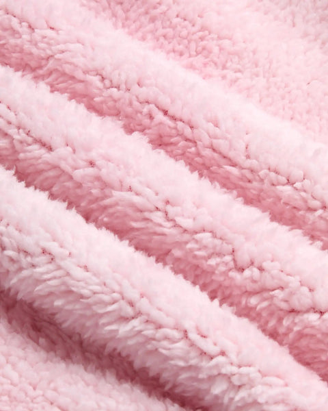 Close-up of vibrant fuchsia pink fleece fabric texture of Girls Cozy Soft Fleece Sherpa Lined Zip Up Hoodie For School And Play, Size 5-6.