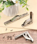 Rock Solid Nickel Plated Hidden Hinges For Cabinet Doors And Shelves Built Tough As Nails With Smooth Swing Operation Easy No Drill Install Heavy Duty Furniture Hardware 10 Pack displayed with screws and a plant.