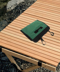 Heavy Duty Portable Chef Knife Roll Bag With Large Capacity And Tear Resistant Fabric on outdoor wooden table