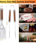 Front view of 34-piece stainless steel BBQ utensils with brown wooden handles, including spatula and tongs.