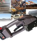 Heavy Duty Handheld Electric Strapping Machine With Rechargeable Battery for Smooth Pp And Pet Tape Binding in warehouse setting.