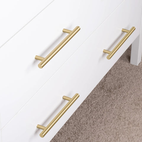 Solid Brass Cabinet Pulls 5 Pack in Brushed Gold Finish Euro Style T Bar Handles with 3 Inch Hole Center on white drawer